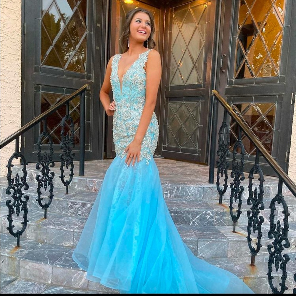 Johnathan Kayne- Light blue custom gown
Final Sale